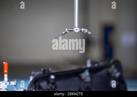 Close up of 3D dimension measurement plastic parts by CMM, 3D automatic measuring system Stock Photo