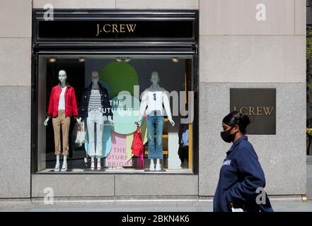 (200505) -- NEW YORK, May 5, 2020 (Xinhua) -- A pedestrian walks past a J.Crew store in Manhattan of New York, the United States, May 4, 2020. J. Crew Group, a U.S. apparel retailer which also operates the Madewell brand, has filed for bankruptcy protection, as the COVID-19 fallout continues to ripple through the nation. It has filed to begin Chapter 11 proceedings in the U.S. Bankruptcy Court for the Eastern District of Virginia, according to a statement by the company on Monday. The company said its lenders have agreed to convert approximately 1.65 billion U.S. dollars of its debt into Stock Photo