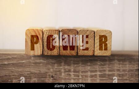 Wooden cubes with word power, concept of power, political or financial Stock Photo