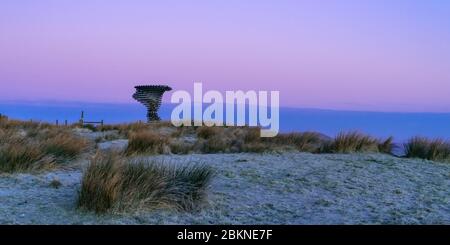 Sunrise at the Singing Ringing Tree in Burnley, Lancashire.  This was taken on a very cold Frosty winter morning. Stock Photo