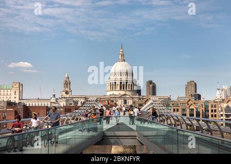 The Millennium Bridge with St Paul's Cathedral in the background. Stock Photo