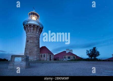 Barrenjoey Lighthouse at the northern end of Palm Beach in Sydney lights the entrance to Pittwater and Broken Bay in New South Wales, Australia Stock Photo