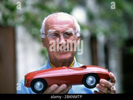 Carlo Anderioni  (1916- 2003) of Carrozzeria Touring with a 1948 model of the Ferrari 166 MM Barchetta at his home in Como Italy 2002 Stock Photo