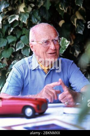 Carlo Anderioni  (1916- 2003) of Carrozzeria Touring with a 1948 model of the Ferrari 166 MM Barchetta at his home in Como Italy 2002 Stock Photo