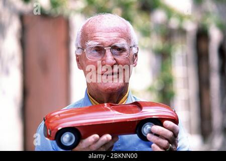 Carlo Anderioni  (1916- 2003) of Carrozzeria Touring with a 1948 model of the Ferrari 166 MM Barchetta at his home in Como Italy 2002 Stock Photo