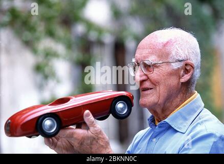 Carlo Anderioni  (1916- 2003) of Carrozzeria Touring with a 1948 model of the Ferrari 166 MM Barchetta at his home in Como Italy 2002 Stock Photo