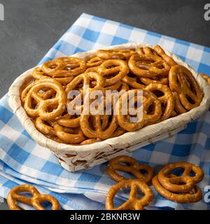 Salted Hard Pretzels on bllue napkin. Stock Photo