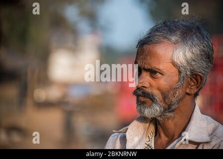 Close-up portrait of an old Indian man.  Assam, India Stock Photo