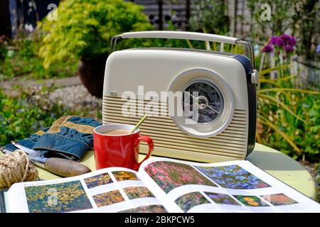 retro vintage style radio on garden table, norfolk, england Stock Photo