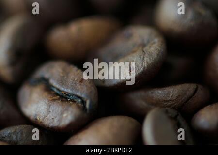 Macro view of roasted coffee beans with selective focus Stock Photo