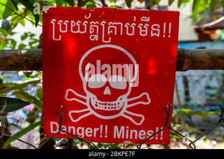 ‘Danger Mines’ Warning Sign At The Cambodian Landmine Museum, Siem Reap, Siem Reap Province, Cambodia. Stock Photo