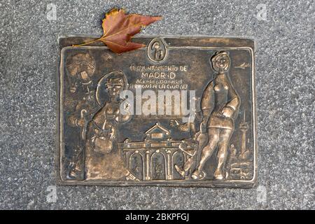 Madrid, Spain - 13 February 2020: Antique bronze plate in front of the tavern entrance in Madrid Spain. Stock Photo
