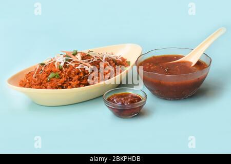 Schezwan fried rice with schezwan sauce, Chinese fried rice,garnished with spring onion and cabbage.indo chinese cuisine dishes.selective focus Stock Photo