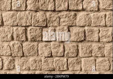 White brick walls that are not plastered background and texture. The texture of the brick. Background of empty brick basement wall. Stock Photo