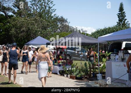 People at Byron Bay Saturday markets with people browsing market stalls,NSW,Australia Stock Photo