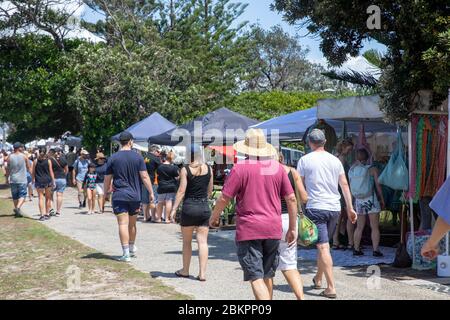 People at Byron Bay Saturday markets with people browsing market stalls,NSW,Australia Stock Photo