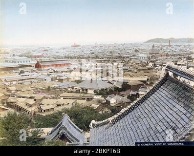 [ 1890s Japan - View of Yokohama ] —   Panoramic view of Yokohama sometime in the 1890s as seen from Narita-san Enmei-in Temple.  The twin buildings on the left are Yokohama Station, opened in 1871 (Meiji 4). The tower in right behind the roof of the temple is the Yokohama Shiloh Church (横浜指路教会), built in 1892 (Meiji 25).  Compare this photo with 70507-0033 – View of Yokohama, shot from the same location around 1881 (Meiji 14).  19th century vintage albumen photograph. Stock Photo