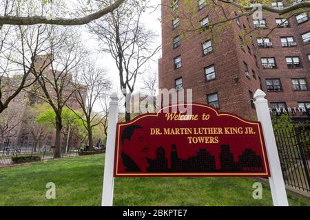 welcome sign to the Dr. Martin Luther King Jr. Towers public housing project in Harlem, part of the New York City Housing Authority or NYCHA Stock Photo