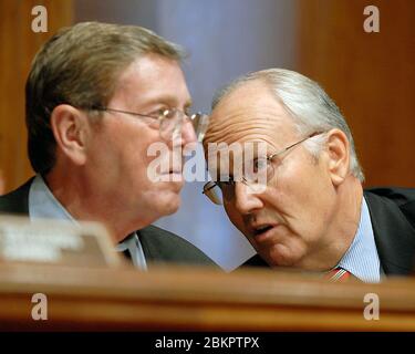 Washington, DC - September 24, 2007 -- United States Senator Larry Craig (Republican of Idaho), right, shares a thought with United States Senator Pete Domenici (Republican of New Mexico), left, during a United States Senate Committee on Energy and Natural Resources hearing on Capitol Hill in Washington, DC on Monday, September 24, 2007. Craig is expected to resign from the Senate this week unless his guilty plea to disorderly conduct charges stemming from his June 11, 2007 arrest during a sting operation in a restroom at Minneapolis-St. Paul International Airport is overturned. Credit: R Stock Photo