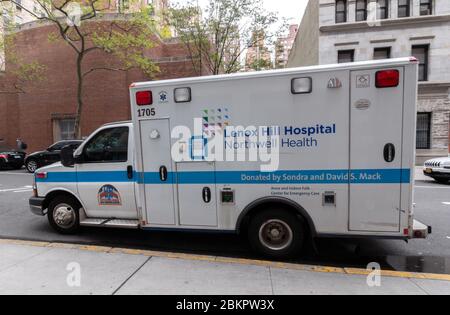 Lenox Hill Hospital ambulance parked in front of the hospital building. Part of Northwell Health, the largest health care provider in the state Stock Photo