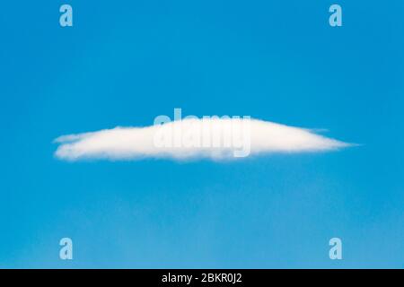 single white cloud on clear blue sky background Stock Photo