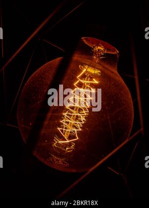 light bulb edison loft incandescent light, dusty flask Stock Photo