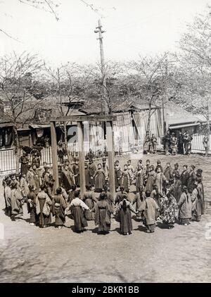 [ 1930s Japan - Japanese School Girls ] —   Elementary school girls in traditional kimono and hakama play in the school yard in 1931 (Showa 6).  20th century vintage gelatin silver print. Stock Photo