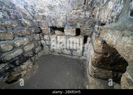 Palestine, Bethany, Occupied West Bank, The interior of the traditional site of Lazarus' tomb in the town of Bethany or al-Azariya in the Occupied West Bank. Stock Photo