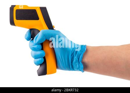 a side view of hand in blue medical latex glove aiming with infrared contactless thermometer isolated on white background Stock Photo