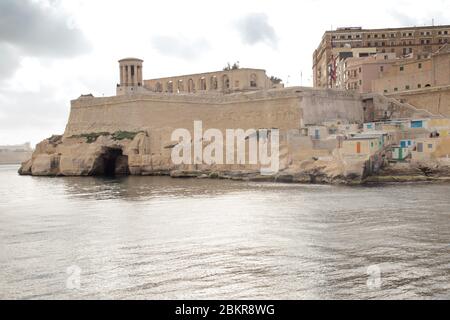 seascape with the Siege Bell War Memorial iin the landscape Stock Photo