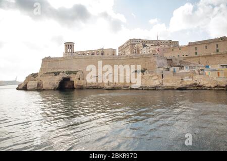 seascape with the Siege Bell War Memorial iin the landscape Stock Photo