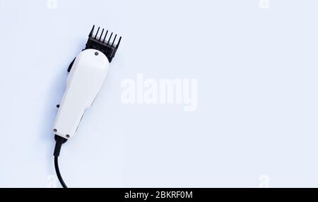 Electric hair clipper on white background. Copy space Stock Photo