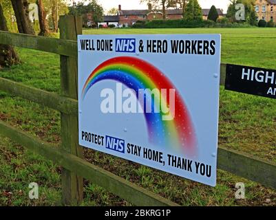 Rainbow tribute to the NHS, appreciation from the British people, in garden, Grappenhall, Warrington, Cheshire, North West England, UK Stock Photo