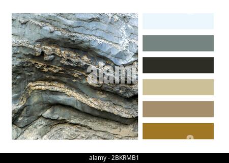 Detail of natural rough stone in a colour palette, with complimentary colour swatches Stock Photo