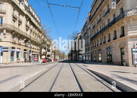 France, Cote d'Or, Dijon, COVID-19 (or Coronavirus) lockdown, area listed as World Heritage by UNESCO, Place Darcy, tramway railway Stock Photo