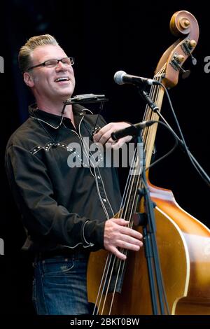 British film critic and musician Mark Kermode plays bass with skiffle group the Dodge Brothers at the Fairport Convention Festival 14th August 2009.