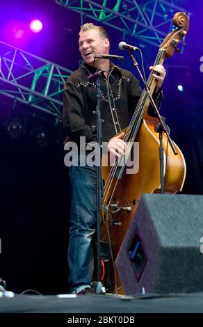 British film critic and musician Mark Kermode plays bass with skiffle group the Dodge Brothers at the Fairport Convention Festival 14th August 2009.