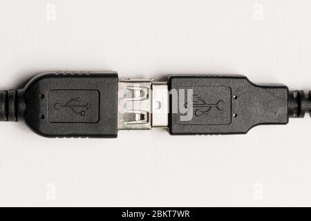 USB Cable connectors close up isolated on white background connecting concept Stock Photo