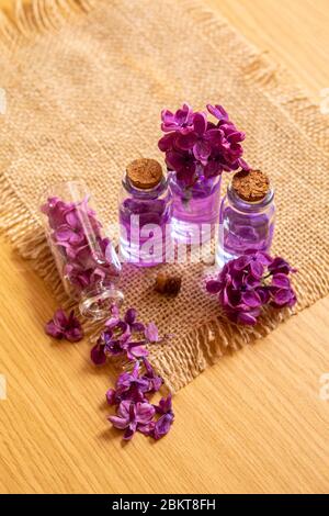 lilac oil in small bottles. selective focus.nat Stock Photo