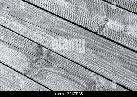 Close-up of rustic textured gray wood planks in diagonal rows Stock Photo