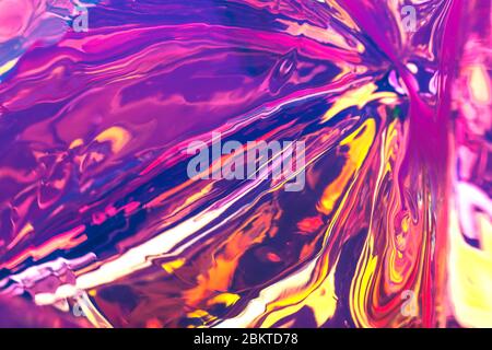 Bright holographic foil background. Multicolor trendy backdrop. Stock Photo