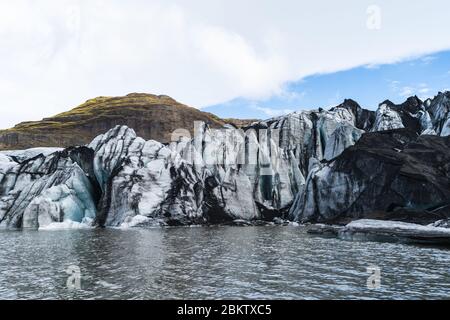 One of the most popular glaciers within the Golden Circle in Iceland is called Solheimajokull and is located near the town of Vik Stock Photo