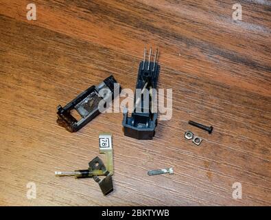 Disassembled vinyl player pickup with a rotary needle. Stock Photo