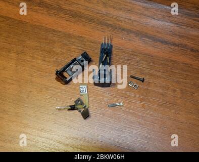 Disassembled vinyl player pickup with a rotary needle. Stock Photo