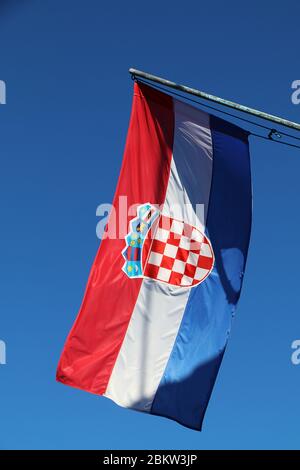 Croatian and EU flag waving in the wind. Flags of Croatia and European ...