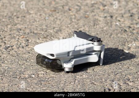 Folded DJI Mavic Mini drone quadcopter closed folded compact small Stock Photo