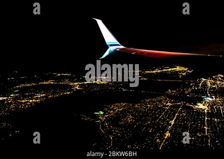 Night flight in December from Chicago arriving in Seattle, USA  [No property release; available for editorial licensing only] Stock Photo