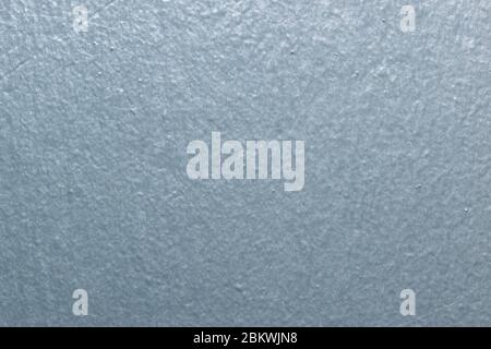 Silver background. Shiny metallic painted wall surface. Stock Photo