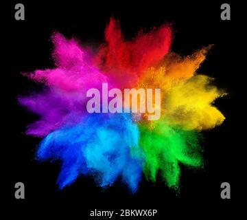 colorful rainbow holi paint color powder explosion isolated on dark black background. peace rgb gaming beautiful party festival concept Stock Photo