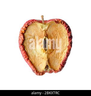 Rotten apple cut in half, aging or disease concept Stock Photo